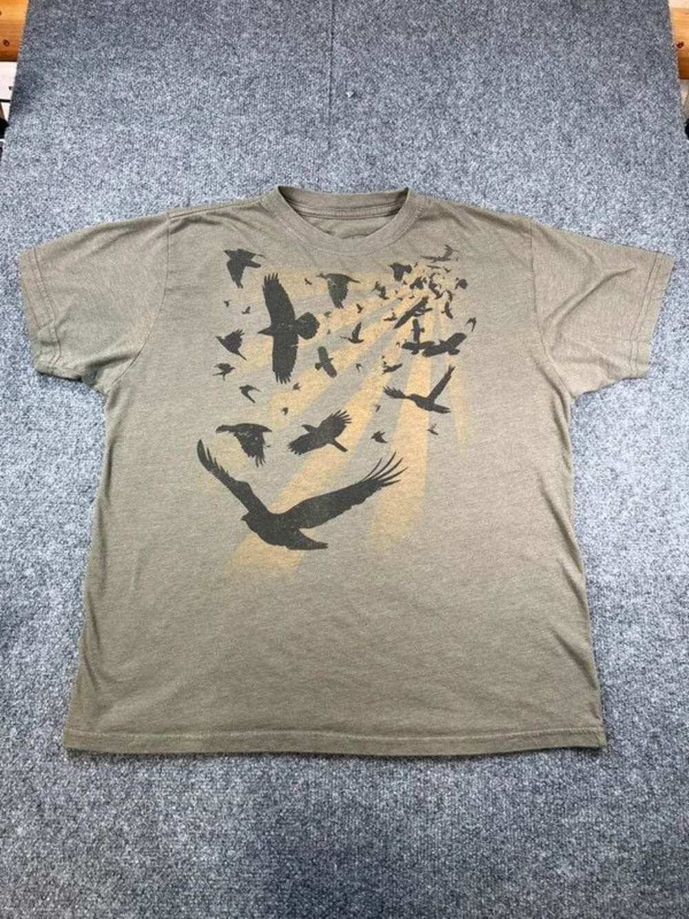 Green men’s shirt with Eagles from Stranded size large F03
